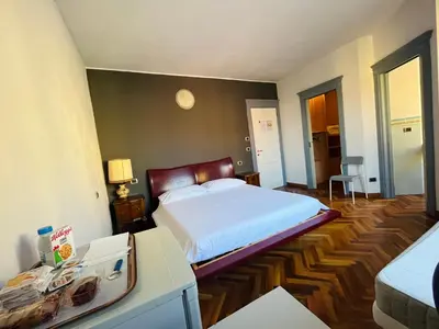 Letto o letti in una camera di B&B LE AMARENE