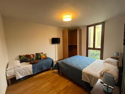 Letto o letti in una camera di B&B LE AMARENE