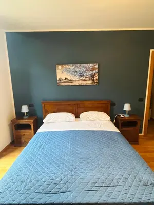Letto o letti in una camera di B&B LE AMARENE