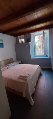 Letto o letti in una camera di La Jeannotte