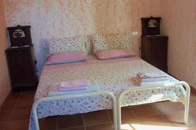 Letto o letti in una camera di Borgoeden