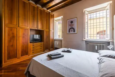 Letto o letti in una camera di [Vista sulla Basilica]