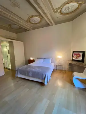 Letto o letti in una camera di BB A PARMA DUOMO