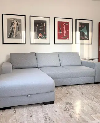 Area soggiorno di Mini Suite Cremona