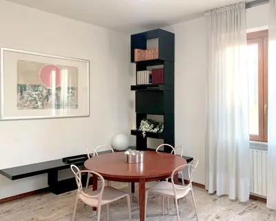 Area soggiorno di Mini Suite Cremona