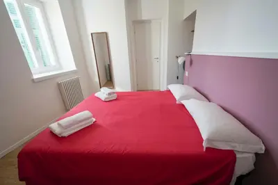 Letto o letti in una camera di 100b - VILLA Ginestra, ampia Terrazza 120m2 vista mare, 3 camere da letto