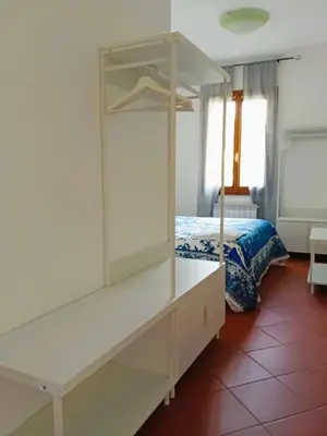 Letto o letti in una camera di INOsteria CAV Appartamenti