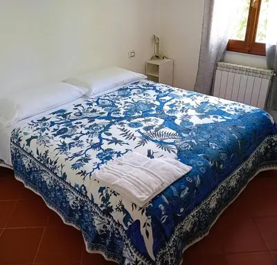 Letto o letti in una camera di INOsteria CAV Appartamenti