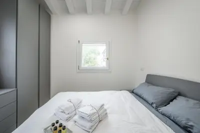 Letto o letti in una camera di Loft Design Free Parking - Maranello - Sassuolo