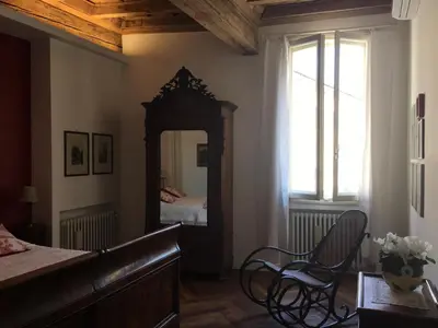 Letto o letti in una camera di B&B L'Affresco