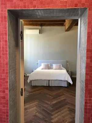 Letto o letti in una camera di B&B L'Affresco