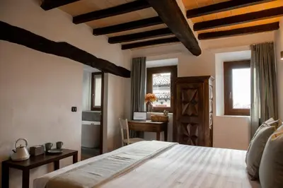 Letto o letti in una camera di Dimidium