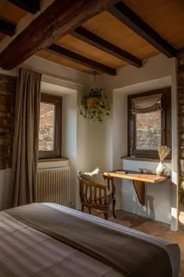 Letto o letti in una camera di Dimidium