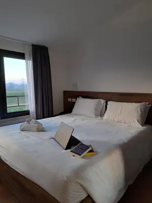 Letto o letti in una camera di BRIXELLUM