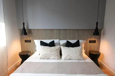 Letto o letti in una camera di 224 - Ma & Ma Luxury Apartment, 500metri da mare e spiaggia, vicino alla Baia del Silenzio - PARCHEGGIO GRATIS PRIVATO INCLUSO