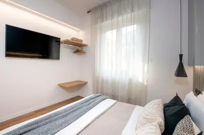 Letto o letti in una camera di 224 - Ma & Ma Luxury Apartment, 500metri da mare e spiaggia, vicino alla Baia del Silenzio - PARCHEGGIO GRATIS PRIVATO INCLUSO