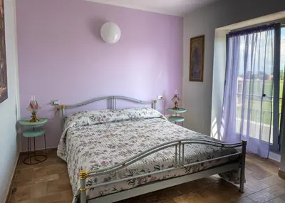 Letto o letti in una camera di Fermo della Guazzona
