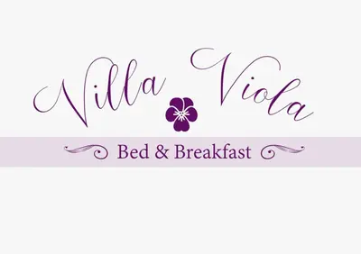 Letto o letti in una camera di VILLA VIOLA B & B