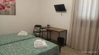 Letto o letti in una camera di VILLA VIOLA B & B