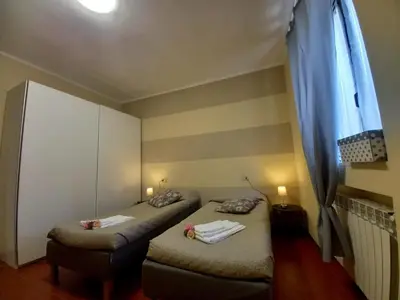 Letto o letti in una camera di Appartamento 8
