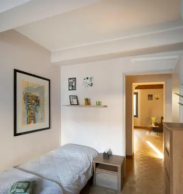 Letto o letti in una camera di Via Verdi LOFT