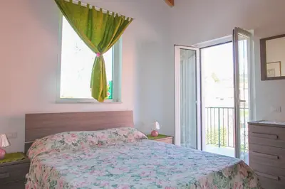 Letto o letti in una camera di Casa vacanze La Fonda