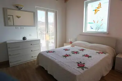 Letto o letti in una camera di Casa vacanze La Fonda