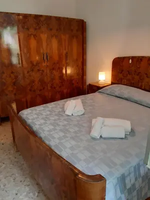 Letto o letti in una camera di Centrale nel verde int 2