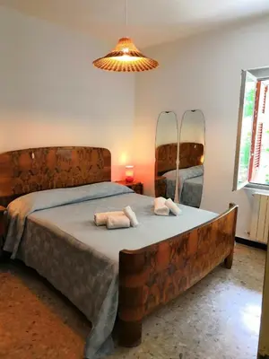 Letto o letti in una camera di Centrale nel verde int 2