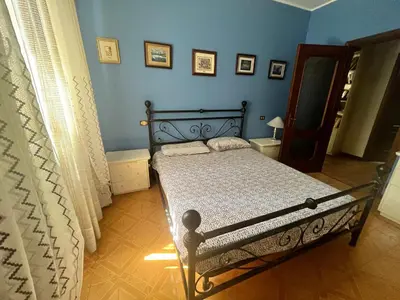 Letto o letti in una camera di Casa Rossa