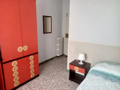 Letto o letti in una camera di Casa Mawi