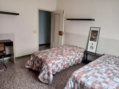 Letto o letti in una camera di Casa Mawi
