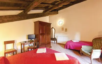 Letto o letti in una camera di Agriturismo Il Bardellino