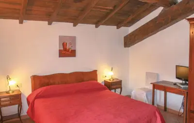 Letto o letti in una camera di Agriturismo Il Bardellino