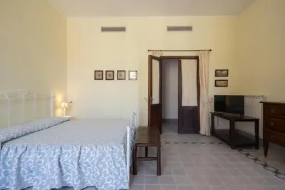 Letto o letti in una camera di MATTEOTTI ROOMS