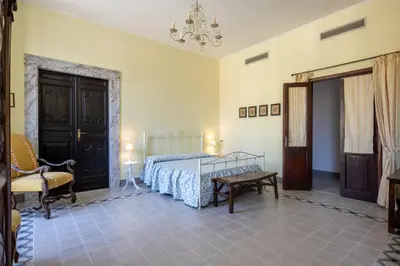Letto o letti in una camera di MATTEOTTI ROOMS