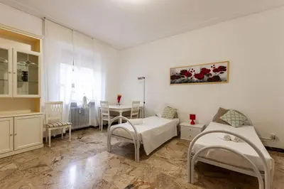 Letto o letti in una camera di Flower apartment