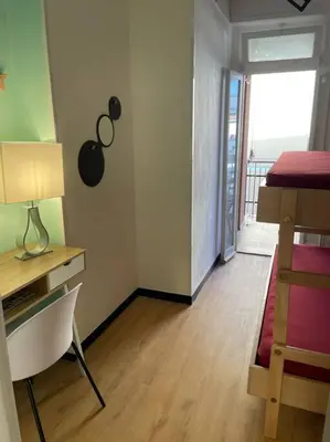 Letto o letti in una camera di A due passi dalla spiaggia