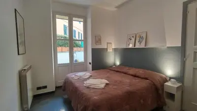 Letto o letti in una camera di Corsini House