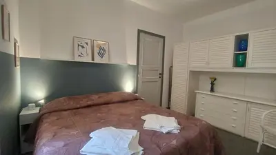 Letto o letti in una camera di Corsini House
