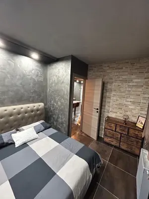 Letto o letti in una camera di THE ROOFTOP