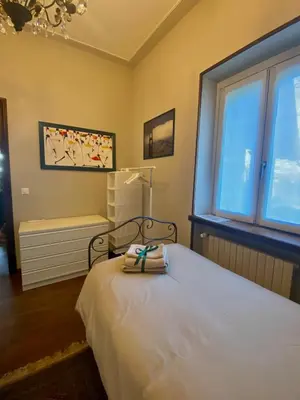 Letto o letti in una camera di Villa Germana