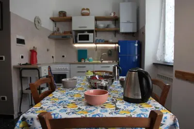 Cucina o angolo cottura di 2 appartamenti totale 12 posti letto