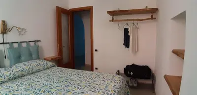 Letto o letti in una camera di 2 appartamenti totale 12 posti letto