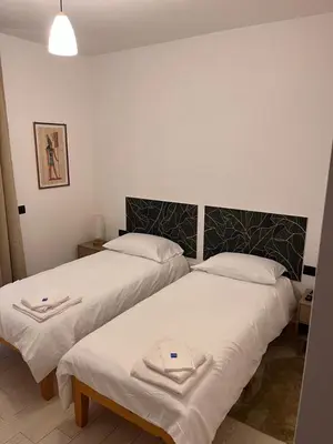 Letto o letti in una camera di LOMA Apartment