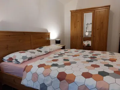 Letto o letti in una camera di Casa Cossi