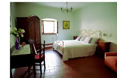 Letto o letti in una camera di Palazzo del Duca