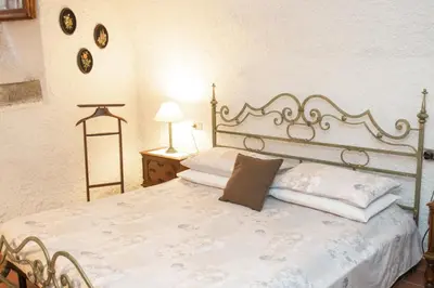 Letto o letti in una camera di Palazzo del Duca