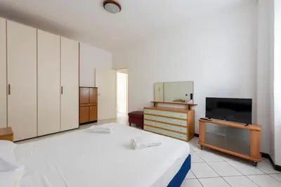Letto o letti in una camera di JOIVY Cosy flat with parking in Chiavari