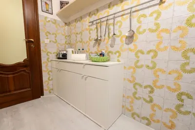 Cucina o angolo cottura di 228 - Casa Guarda Stelle - In Residence con Piscina e Aree esterne comuni a 1km dal Mare